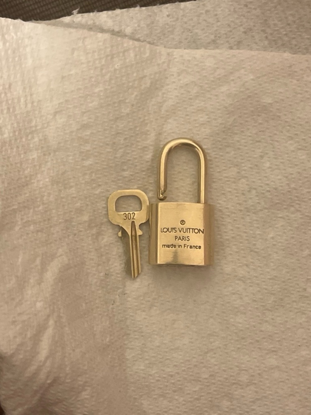 Preowned Louis Vuitton Gold Padlock and Key Set (302)